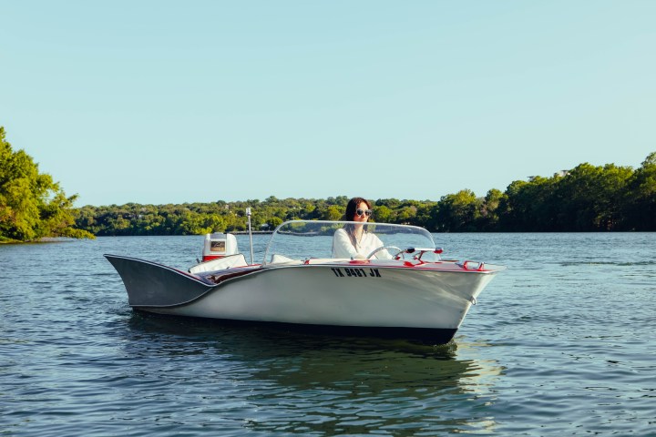 a small boat in a body of water