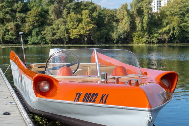 a small boat in a body of water