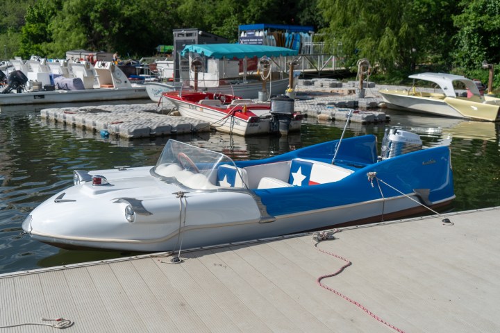 a boat parked next to a body of water